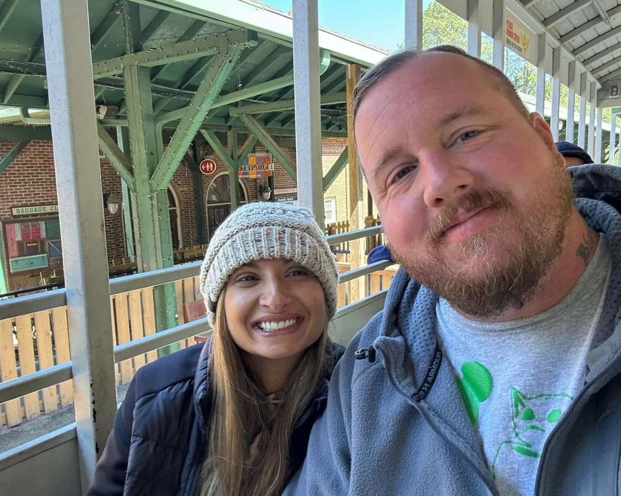 EverAddress founders and operators Anthony and his wife smiling together.